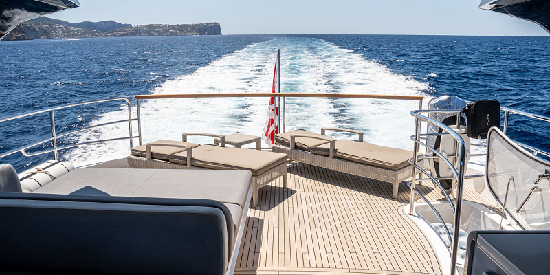 Yacht for charter in Mallorca Sunseeker 88 Moonlight underway with mountains on horizon